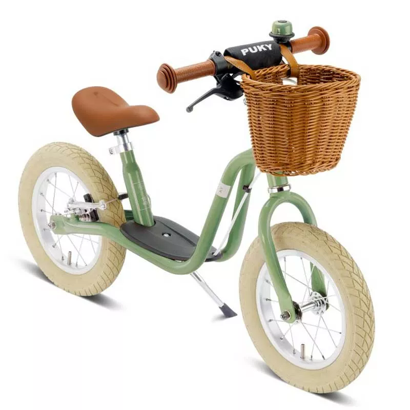 Balance bike with brakes and basket PUKY LR XL BR CLASSIC in retro green color.