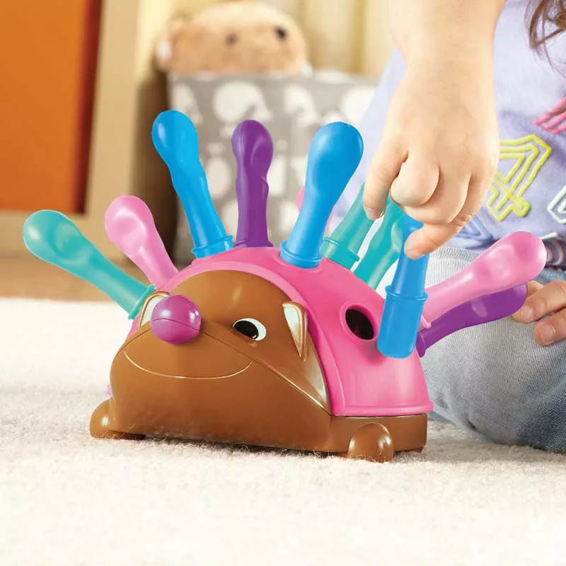 Baby toy for fine motor skills - Spike the Hedgehog - pink