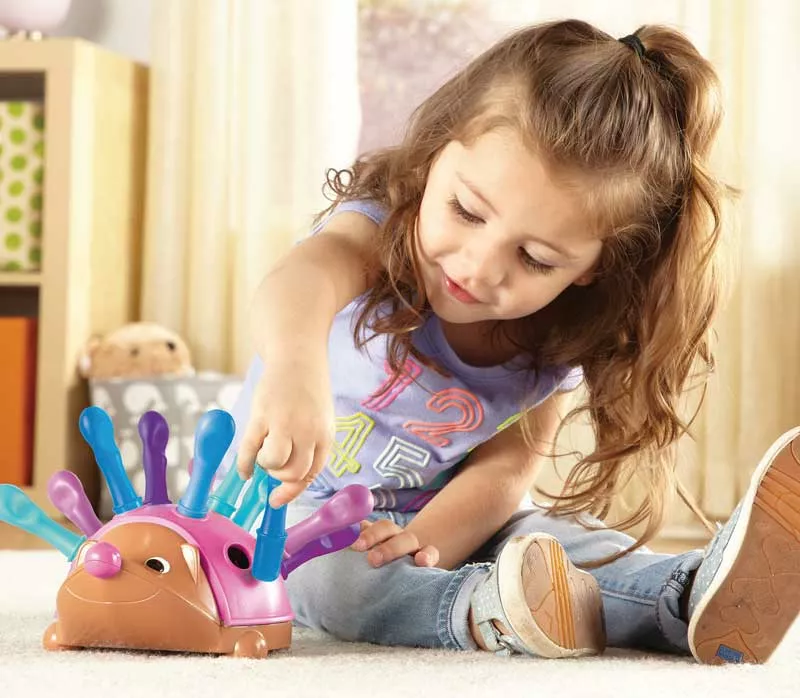 Baby toy for fine motor skills - Spike the Hedgehog - pink