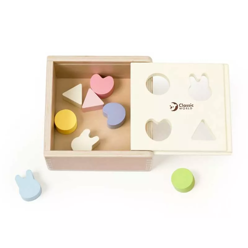 Wooden box for sorting shapes in pastel colors