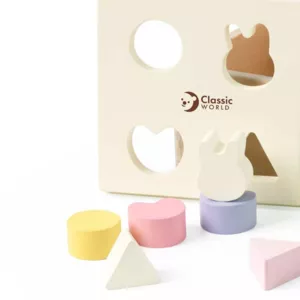 Wooden box for sorting shapes in pastel colors