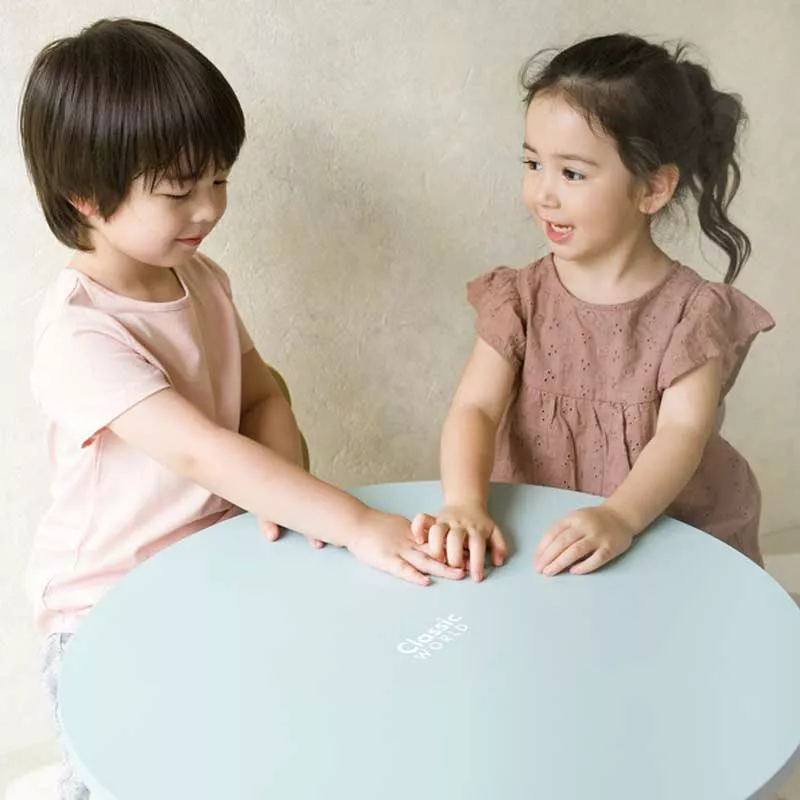 Wooden table for a children's room in pastel blue color