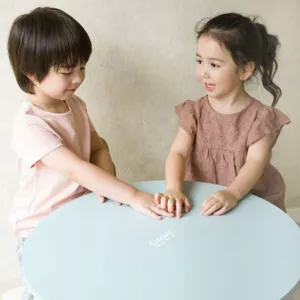 Wooden table for a children's room in pastel blue color