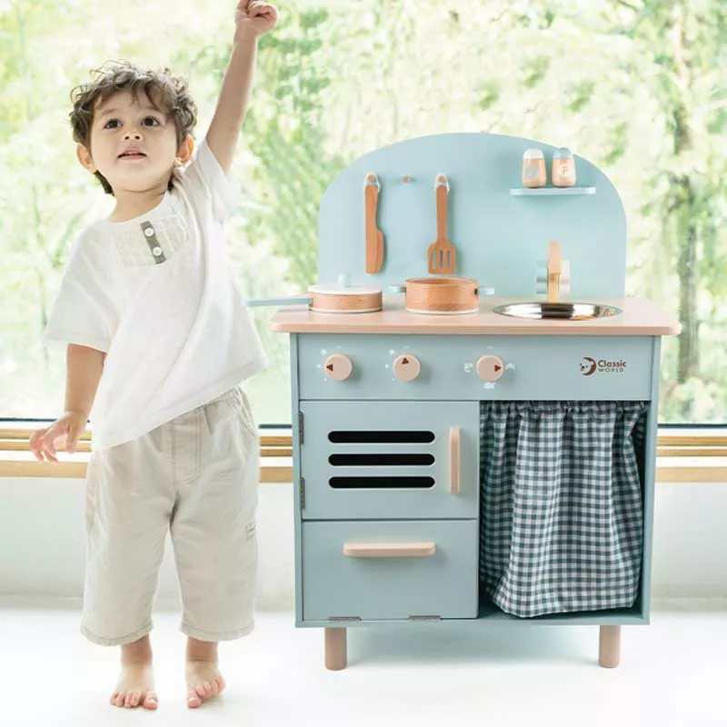 Wooden retro kitchen for children in blue color