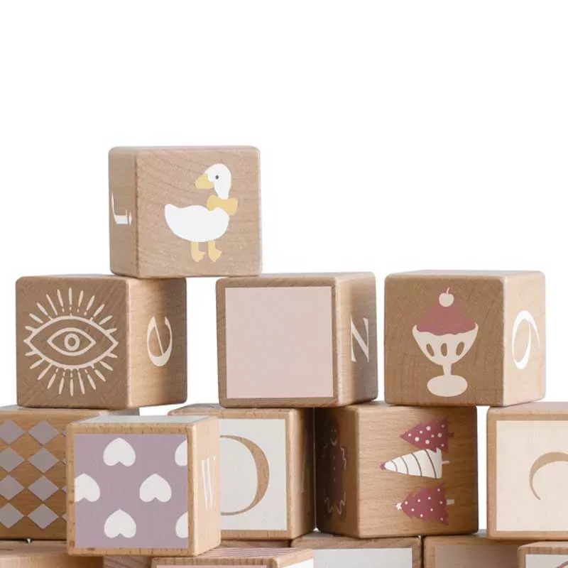 Children's construction set made of wooden blocks with various symbols