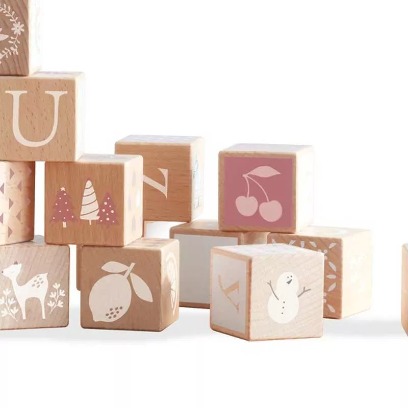 Children's construction set made of wooden blocks with various symbols