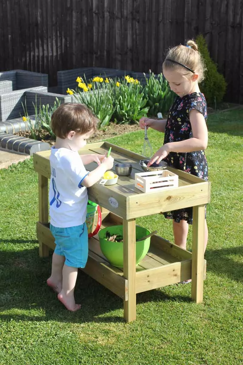 Children's outdoor play kitchen table with accessories