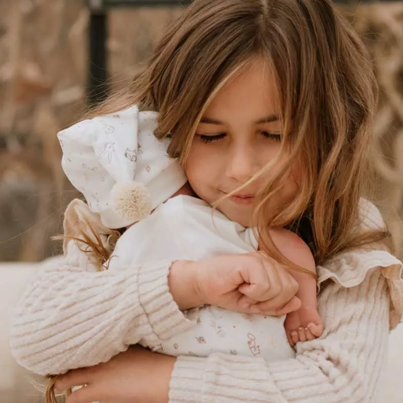 Doll-baby Adai with carrying basket in beige - 40 cm