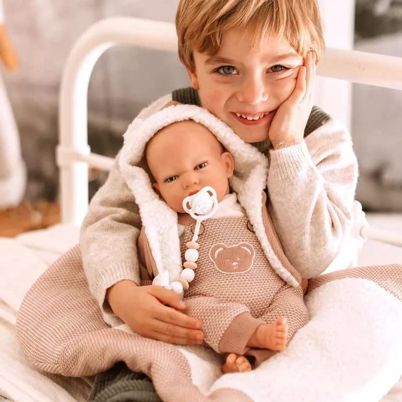 Doll baby Jade with a pink knitted costume and diaper, realistic weight - 40 cm