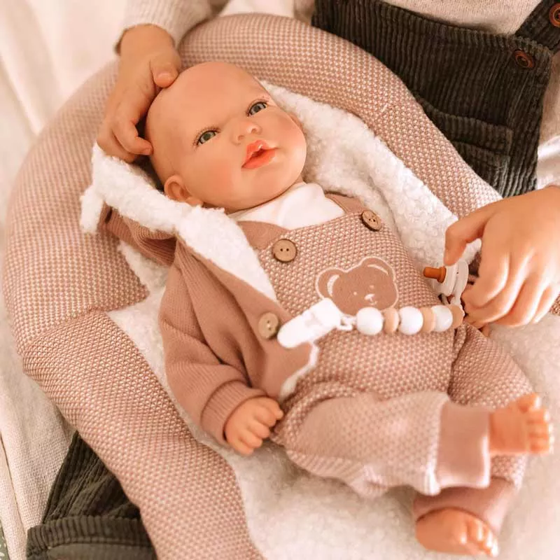 Doll baby Jade with a pink knitted costume and diaper, realistic weight - 40 cm