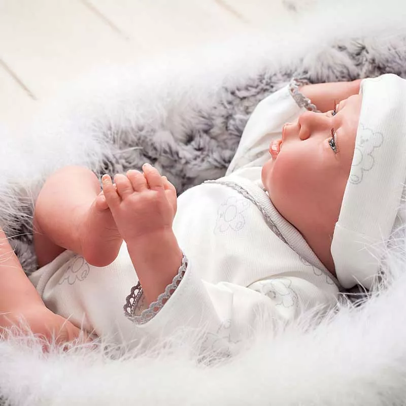 Baby doll Noel with a basket and accessories - 40 cm