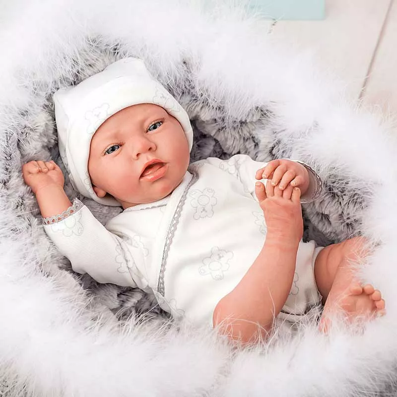 Baby doll Noel with a basket and accessories - 40 cm