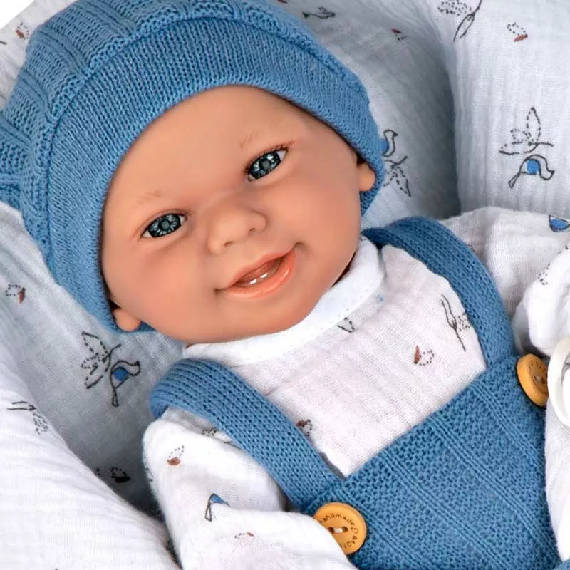 Doll baby in navy blue jumpsuit and sleeping bag - 33 cm