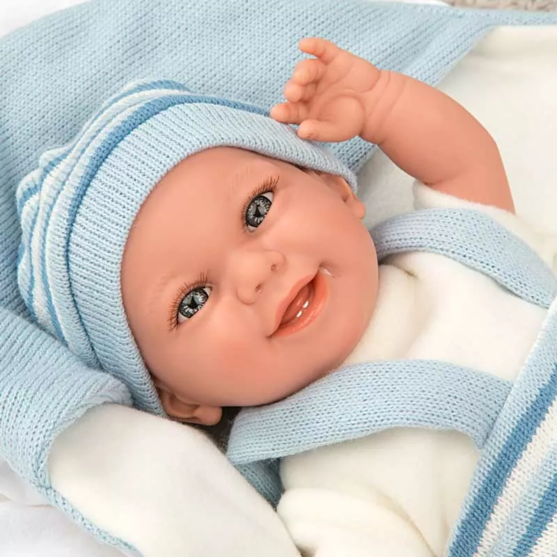 Smiling baby doll in light blue with accessories - 35 cm, realistically weighted