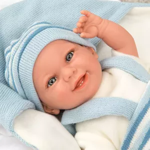 Smiling baby doll in light blue with accessories - 35 cm, realistically weighted