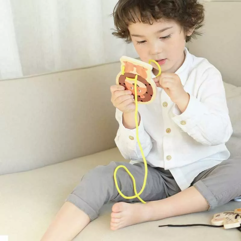 Fun children's game - stringing beads, African animals