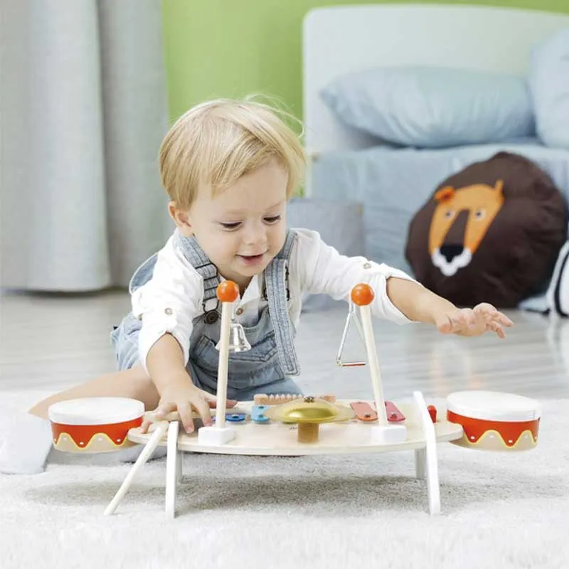 Children's wooden table with musical instruments