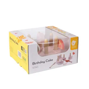 Children's wooden cake with candles in a pastel pink color.