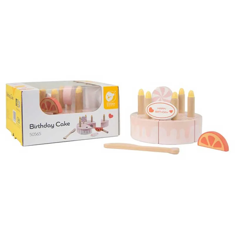 Children's wooden cake with candles in a pastel pink color.