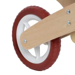 Wooden balance bike Classic World in burgundy color, for ages 2 and up.